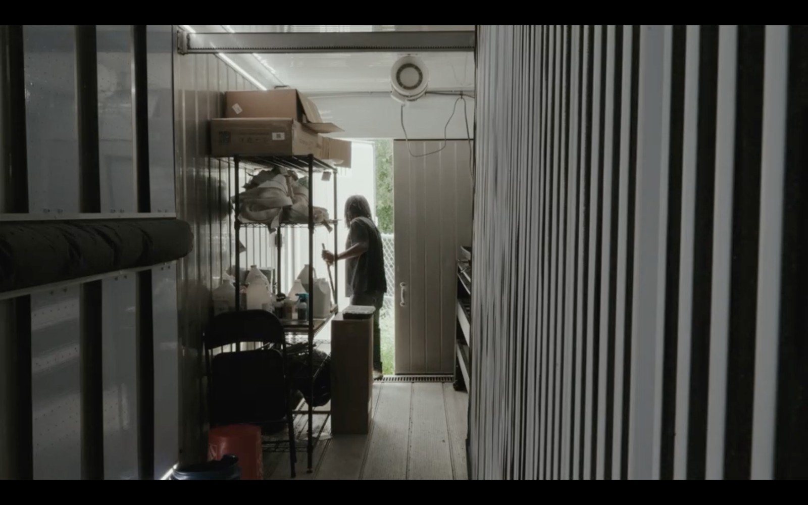 Worker inside a hydroponic farm
