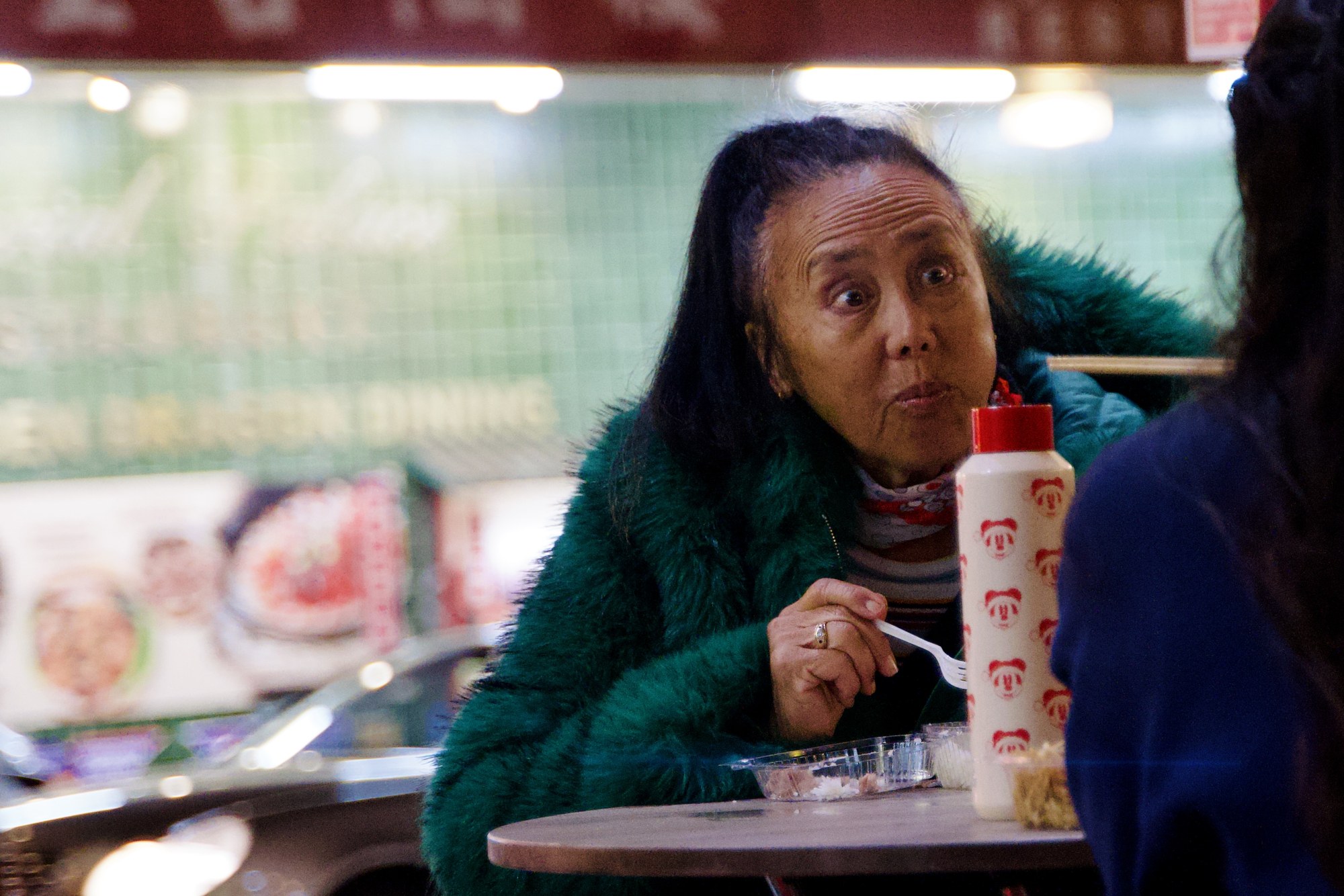 A woman at a mahjong table