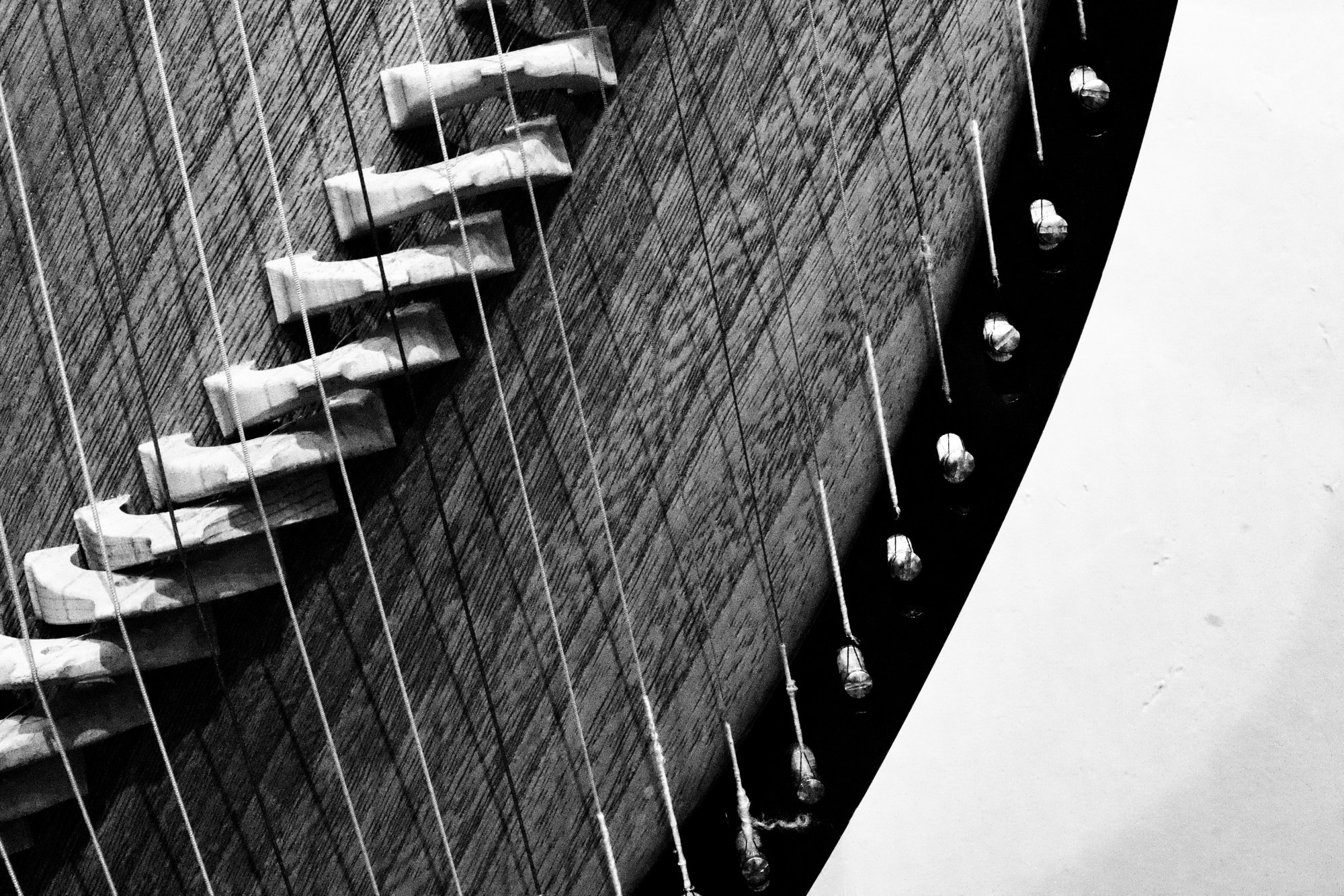 A curved architectural detail in black and white