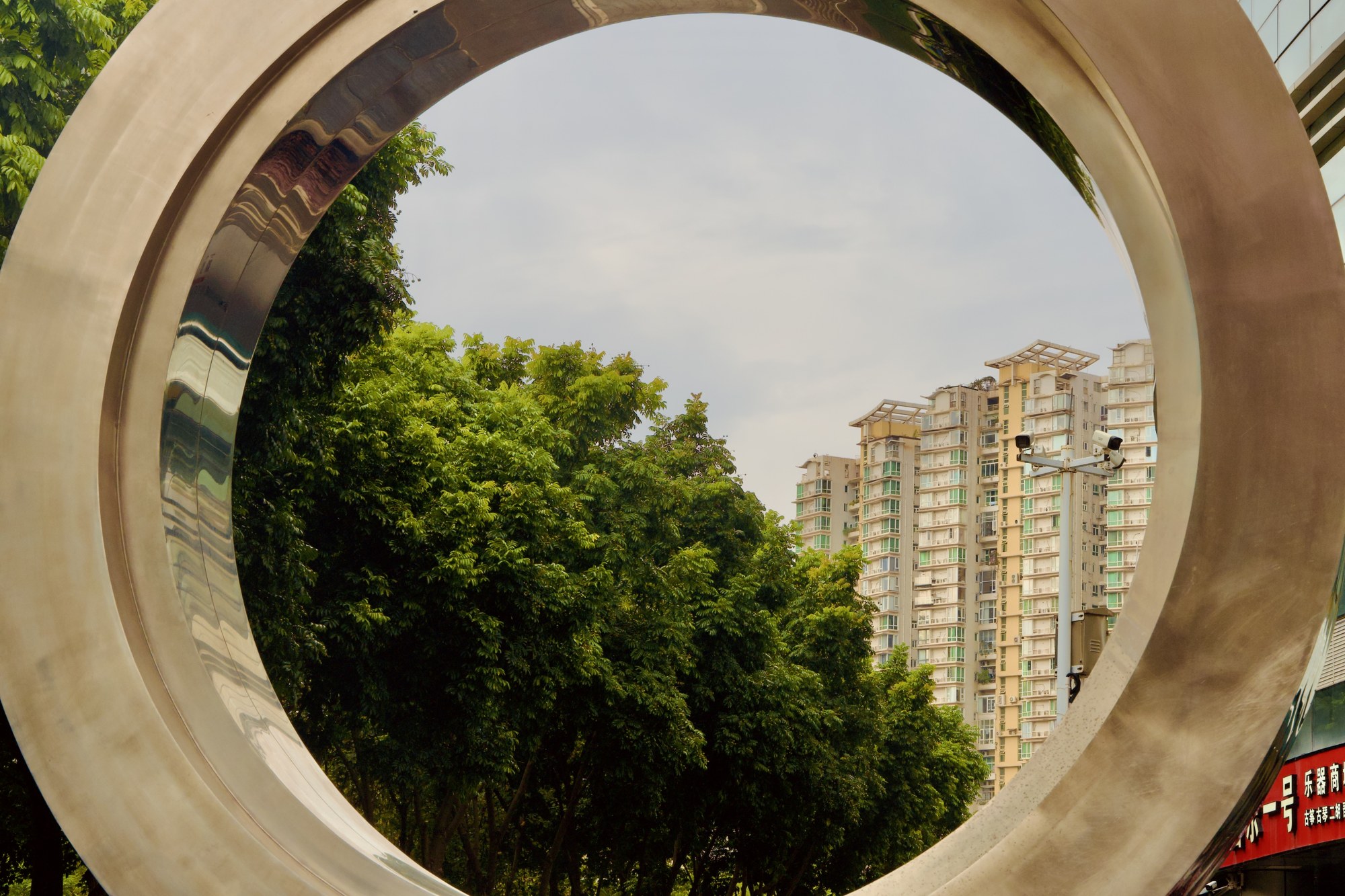 Buildings framed by a circular opening