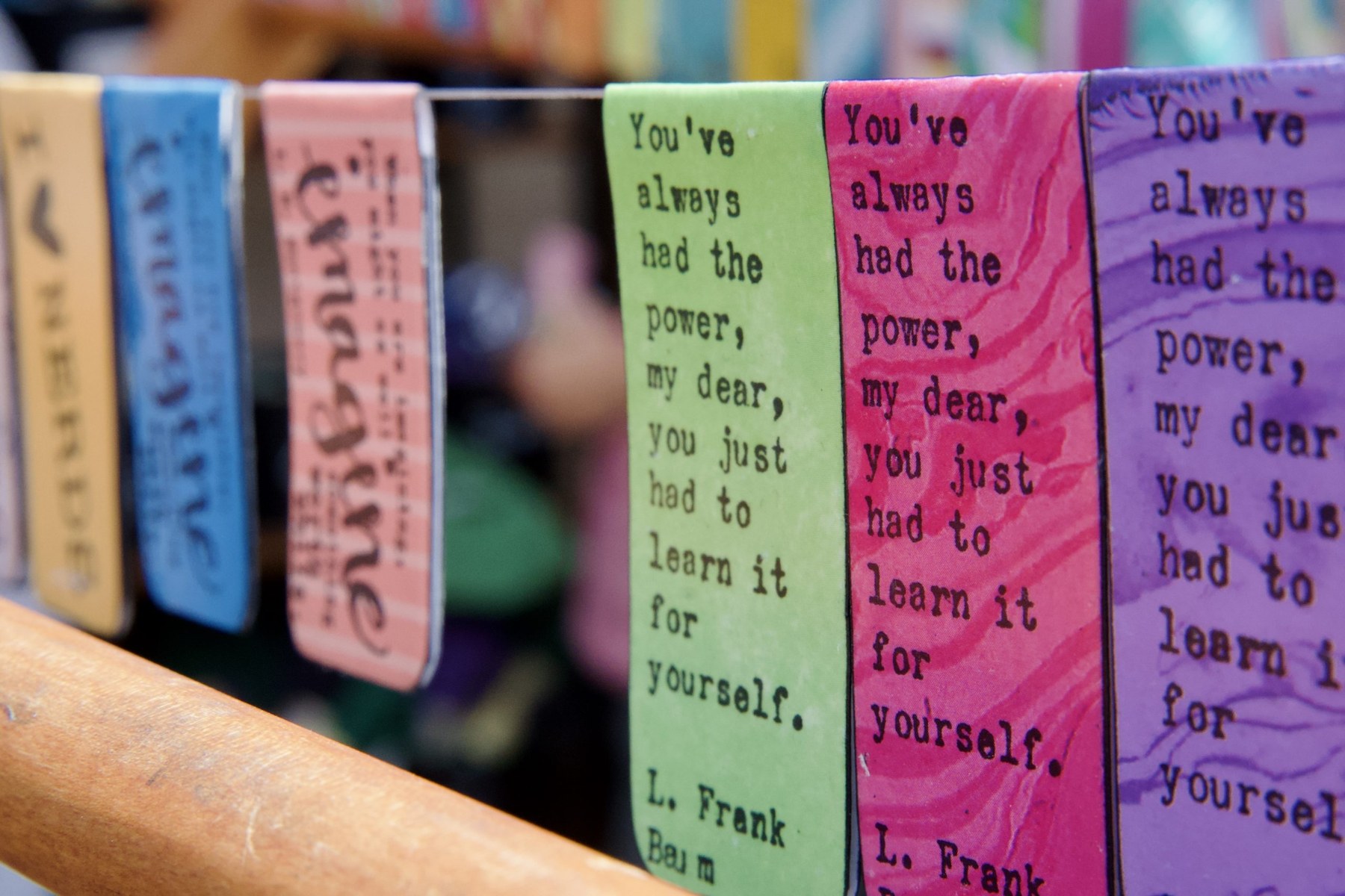 Handmade magnetic bookmarks made by Elizabeth and Robert Fontenot on display.