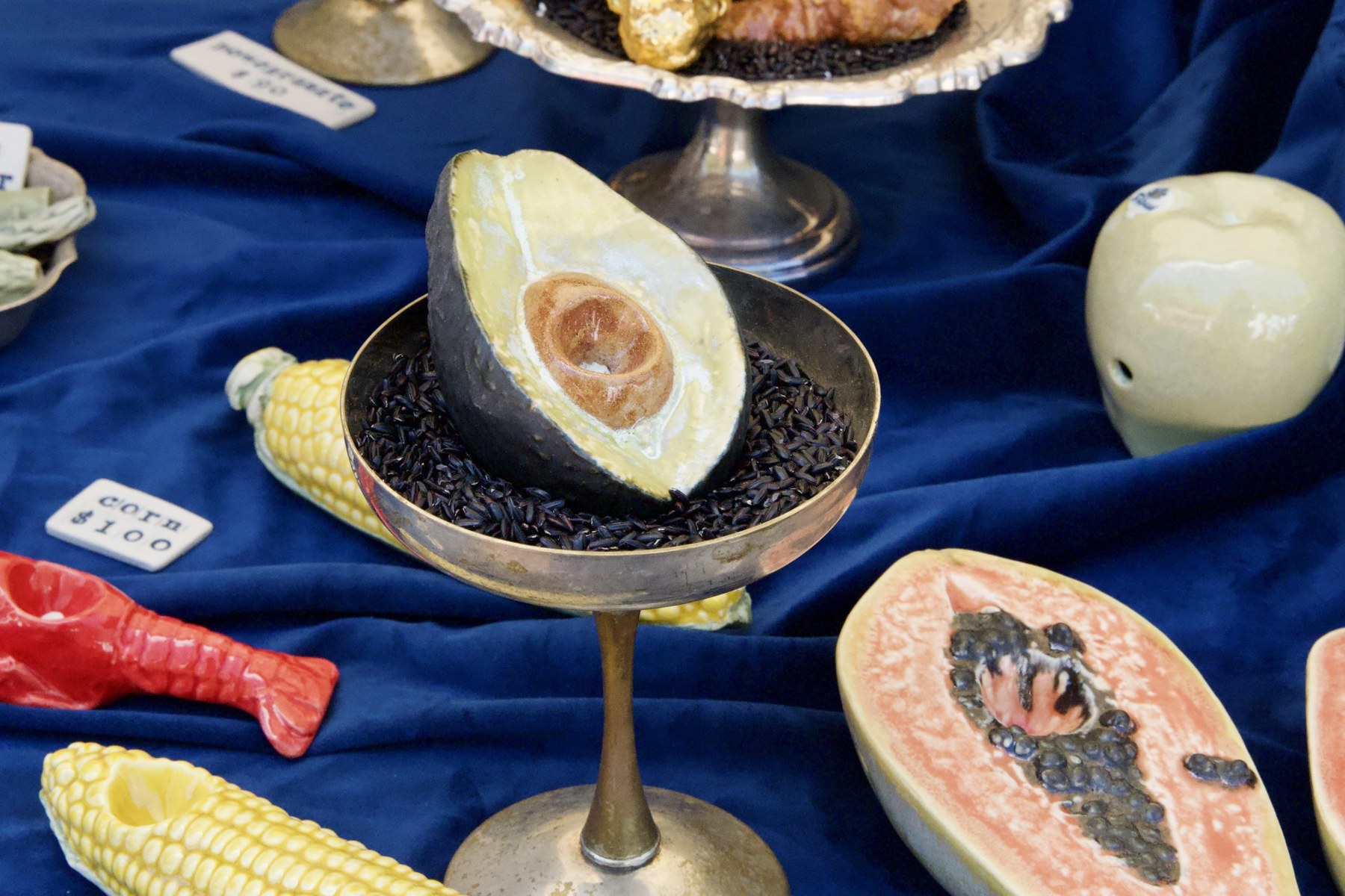 A surreal ceramic avocado on display at Ficus Ceramica, a porcelain slipcasting studio owned by Kate Clarke, who is based in New Orleans.