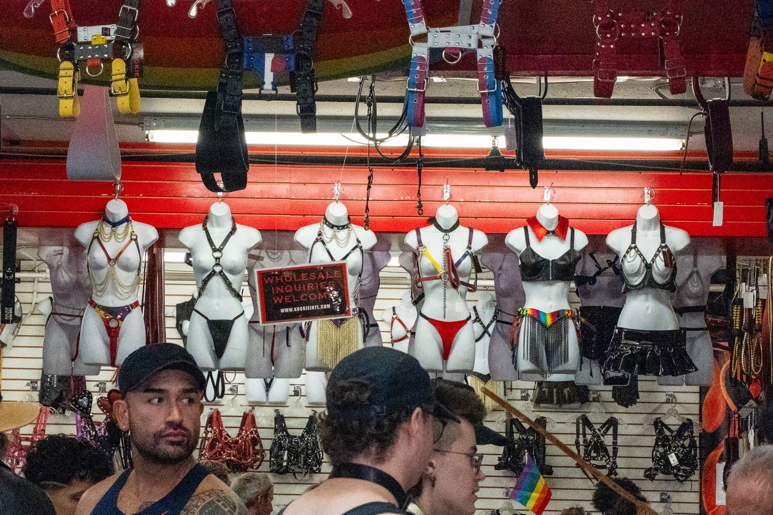 Fairgoers browse a stall displaying leather accessories at the 43rd annual Folsom Street Fair in San Francisco on Sept. 27, 2026.