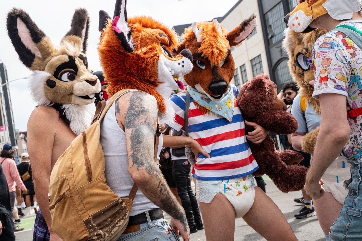 Fairgoers wearing animal costumes gather for a photograph at the 43rd annual Folsom Street Fair in San Francisco on Sept. 27, 2026.